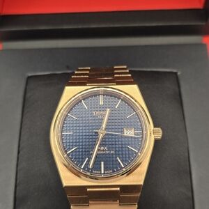 Tissot Rose Gold Watch with Textured Blue Face